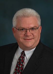 Headshot of Kevin G. Harvey